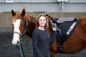 James Dyson award winner and Massey University industrial design graduate Holly Wright with her therapeutic equestrian saddle for disabled riders.