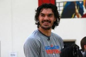 Adams buys new phone before haircut