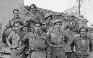 The 28th Māori Battalion waiting to move up into the front lines from Gambettola, Italy on 19 October 1944.