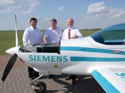 An eFusion aircraft with company executives in happier times. 