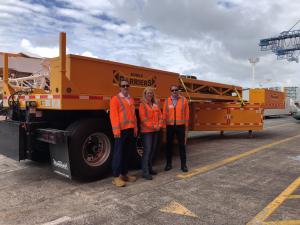 Gary Bonser, AMA Maintenance Manager,  Jennifer Hart, Acting AMA Director and Paul Geck, NZTA Acting System Manager take delivery of the MBT-1 mobile motorway barrier.